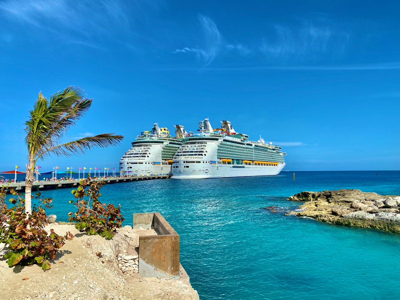 Luxury liners sailing on bright ocean near city port